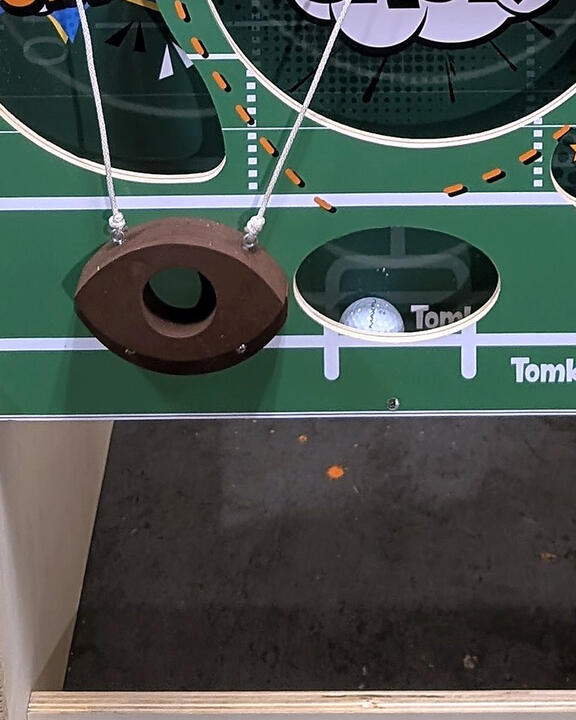 Ball-lift bar and lower scoring holes, close-up Ball-lift bar and lower scoring holes, close-up